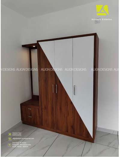 Completed Wardrobe at Kakkanad
ALIGN DESIGNS 
Architects & Interiors
2nd floor,VF Tower
Edapally,Marottichuvadu
Kochi, Kerala - 682024
Phone: 9562657062