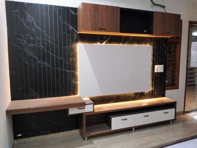 TV unit design #LivingRoomTV #FlooringTiles #LivingRoomTVCabinet #tvunits #LivingroomTexturePainting