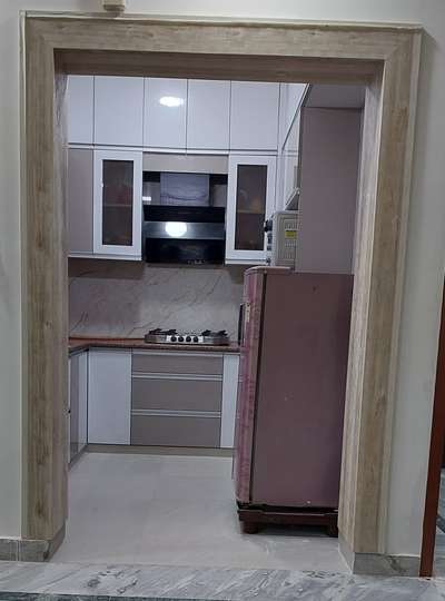 Modular kitchen by Rishi Home Interior