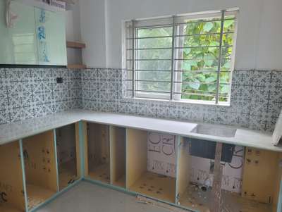 L type kitchen work in progress 
we do all contract as per designs within budget , price varies with quality of materials which we selects.. #homeinterior 
 #dote
#dcareinteriors
 #Ltylekitchen
 #KitchenIdeas 
#KitchenRenovation 
 #ModularKitchen