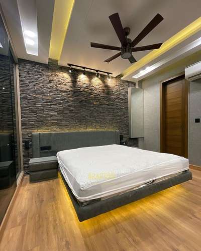 Master bedroom fully renovation 
#HouseDesigns #MasterBedroom #KingsizeBedroom #GlassDoors #WoodenFlooring #FalseCeiling  #InteriorDesigner #LUXURY_INTERIOR  #stargazeinteior