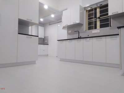 Kitchen cabinet,  Noel greenature, Kakkanad,@Thomson woodex with acrylic white lam #