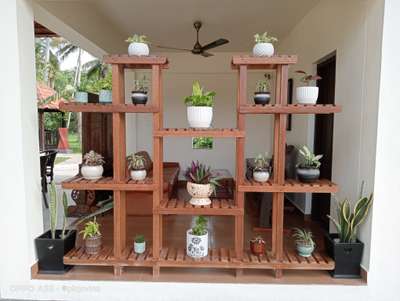 Works done teek wooden stand with ceramic planters
 #gardendesigner #RockGarden #landscapephotography #LandscapeGarden