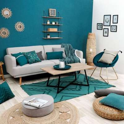 Get this stylish and expressive living room featuring a soft gray color palette accented with pops of teal. Add jute ottoman pouffe, round jute rug, modern bamboo floor lamp and attractive wall mirror to decorate your space.
#interior #decor #ideas #home #interiordesign #indian #colourful #decorshopping
