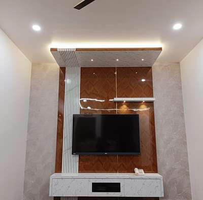 Tv Unit 

 #tvunit  #LivingRoomTV  #LivingRoomTVCabinet  #tvcabinet  #TVStand  #tvunitinterior  #tvunitideas  #tvunitdesigns  #LivingroomDesigns  #LivingRoomTV  #FalseCeiling  #LivingRoomCeilingDesign  #GypsumCeiling  #wallpaperforlivingroom  #wallpaper  #wallpaperfloral  #louvers  #louverpanel  #louversplank  #laminateddoor  #laminated  #spotlights  #mica  #micalaminations  #HouseRenovation  #renovation  #renovatedhome  #budgetfriendlyrennovation  #HomeDecor  #interiors  #InteriorDesigner  #thrissurinteriors  #viral  #trendingdesign  #kolofollowers  #kolocreators  #lowrate