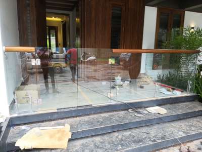 Hand rail with glass door