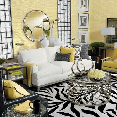 Let's go bold with some bright yellow and white. Fix a yellow wallpaper and use a round mirror to enlarge the space. Add an animal print rug in black and white and cushions in alternating colours of white, black and yellow.
#interior #decor #ideas #home #interiordesign #indian #colourful #decorshopping