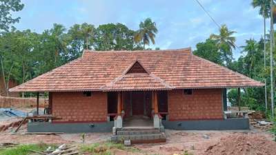 #TraditionalHouse  #SemiTraditionalStyle  #traditionl  #2BHKHouse  #3BHK  #8848240188  #KeralaStyleHouse  #keralahomedesignz  #SlopingRoofHouse  #WoodenCeiling  #ecofriendlyliving  #ecofrindlyhouse  #pillerdesign