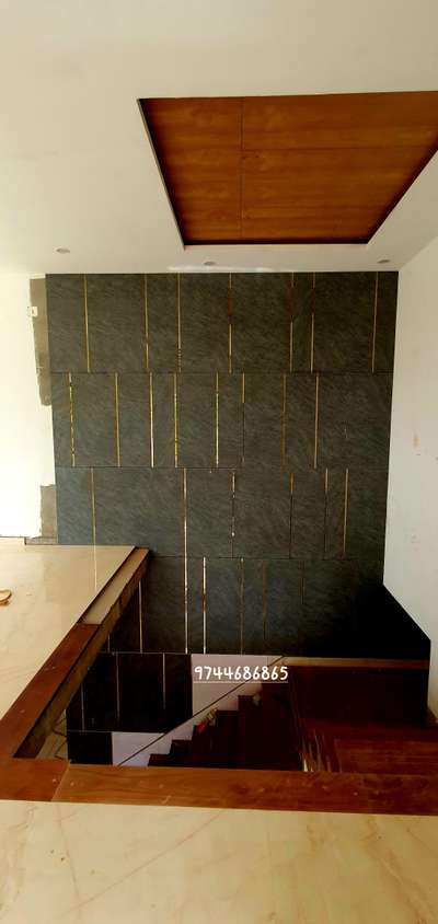 wall paneling ( foam sheet + mica + golden strip).
#HomeDecor 
#Architectural&Interior 
 #LivingroomDesigns 
#keraladesigns