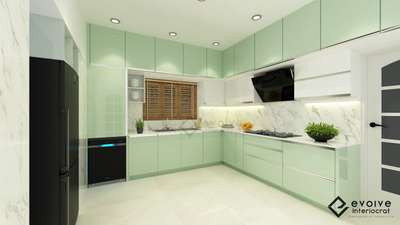 This modern kitchen designed by Evolve Interiocrat features a soothing mint green and white color palette, creating a fresh and inviting atmosphere💚

The glossy mint green cabinetry provides ample storage while reflecting light, enhancing the room's brightness 🪄

#luxuryliving
#interiordesignexcellence
#timelesselegance
#innovativedesign
#dreamhome
#interiorinspiration
#homedecor
#craftsmanship
#designgoals
#interiordecor
#homedesign
#creatingbeautifulspaces
#styleandsubstance
#highendliving
#masterpiece
#creativespaces
#modernluxury
#elegantinteriors