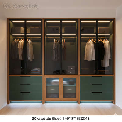 This spacious wardrobe features a sophisticated design with a combination of deep green and natural wood finishes. The upper doors are adorned with sleek black glass, adding a touch of modern elegance, while the lower doors incorporate a central frosted glass panel for a subtle visual break. Integrated sky blue frosted mica with internal lighting provides a soft, inviting glow, illuminating the interior. This wardrobe is not just a storage solution but a statement piece, blending functionality with contemporary style.
SK Associate Bhopal


#TrendingNow #ViralReels #InstaDaily #ExplorePage #InstaGood #CreativeDesign #WorkInProgress #InteriorDesign #ModernLiving #HomeDecor #FurnitureDesign #ModularFurniture #WoodWork #InteriorGoals #HomeStyle #FalseCeiling #WardrobeDesign #CustomFurniture #CarpentryWork #Bhopal #BhopalDiaries #BhopalCity #BhopalLifestyle #BhopalCreatives #BhopalBusiness #MadeInBhopal #BhopalHomeDecor