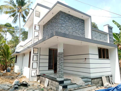 900/2 bhk/Modern style
/double storey/Ernakulam

Project Name: 2 bhk,Modern style house 
Storey: double
Total Area: 900
Bed Room: 2 bhk
Elevation Style: Modern
Location: Ernakulam
Completed Year: 

Cost: 15 lakh
Plot Size:
