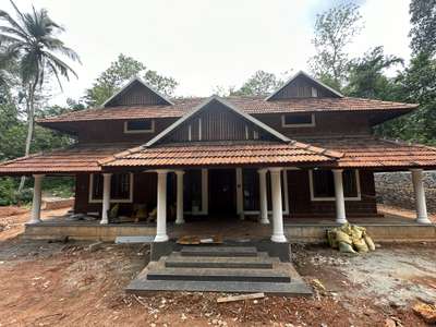 2180 Sq. Ft 4 bhk + Nadumuttam Finishing stage , Traditional style nalukettu veedu                                details please contact :https://wa.link /2c4fnw  #nalukettveddu  #Freeplan_Nadumuttam_singlefloor  #TraditionalHouse #traditionalstylehouse  #keralatraditionalmural  #keralahomedesignz  #kerala_architecture  #keralaarchitectures  #keralatraditionalarchitecture