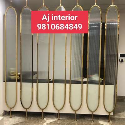 Oval shape partition work done in stainless steel with PVD coating deliver in gujrat Ahmedabad customized available for requirement