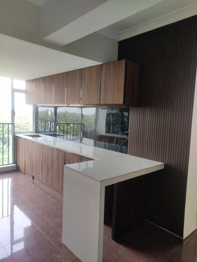 Rate this..budget friendly
#ModularKitchen  #KitchenIdeas  #LargeKitchen  #KitchenCabinet  #WoodenKitchen  #nanowhite  #InteriorDesigner  #KitchenInterior