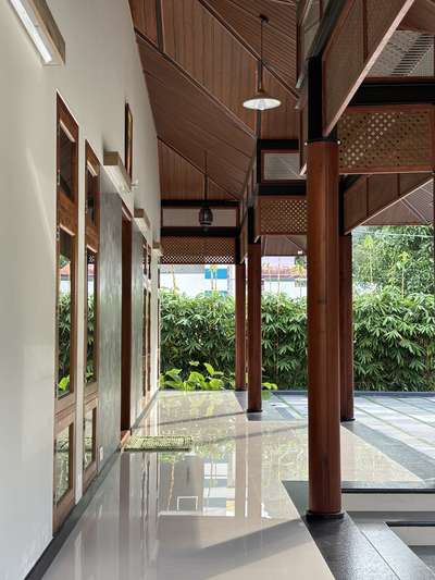 A contemporary take on traditional Kerala architecture, this residence brings together timeless proportions, pitched roofing, and warm wooden detailing with a refined modern sensibility. The long, symmetrical frontage opens into a calm and inviting central axis, creating a strong architectural presence rooted in regional context. Subtle material tones, deep verandah edges, and crafted lattice elements enhance both aesthetics and climate responsiveness.Developed in collaboration with PCA, the design blends tradition and modern comfort, creating a home that feels grounded, serene, and contextually connected.
2800 sqft | Client: Sibi | Location: Amboori, Trivandrum
#Architecture #KeralaArchitecture #ContemporaryTradition #ModernResidence #RegionalDesign #ArchitecturalDetails #CourtyardHome #TrivandrumHomes #koloprojects