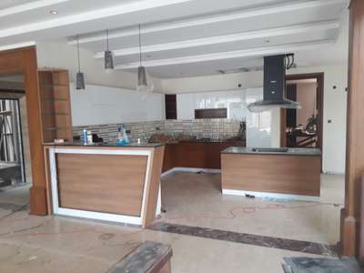 laquerd glass kitchen cabinets in kottarakkara