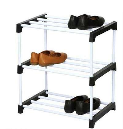 DODO Collapsible Shoe Stand 4 Shelves Rack (Black)  Shoe Racks
Name: DODO Collapsible Shoe Stand 4 Shelves Rack (Black)  Shoe Racks
Material: PVC
Type: Collapsible Shoe Stand
No. of Compartments: 4
Size: 4 Shelves
Net Quantity (N): 1
Presents Smart , compact neat and intelligently designed shoe rack to extend maximum utalization of the space occupied. Made up of Solid Plastic Pvc offering maximum durability. This PVC Pipe are more effective & strong incomparision to iron pipe as well as it's Rust free & long life.

Country of Origin: India