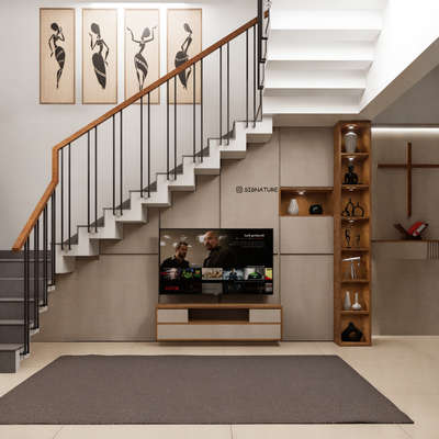 A warm and contemporary family living area designed with a blend of functionality and aesthetics.
#interiordesign #staircases #tvunitdesign