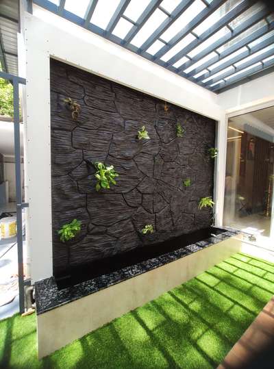 PATIO DECOR 
customized design 
cement cladding,CASCADA, indoor plants,

site @malaparmpu,calicut
DREAMCATCH DECOR OF SPACES
9847522529 
 
 #patio #patioarea #patiodesign #patiodecor #Indoor #pondscaping #cascade #fountain #IndoorPlants #HomeDecor #ContemporaryStyle #contemporaryhomes #home #pond #waterfountains #waterfountain #plants #indoorcourtyad #indoorgarden #IndoorPlants #indoorplantsdecor #courtyard  #courtiyard  #rockwall #cementartwork #cementdesign