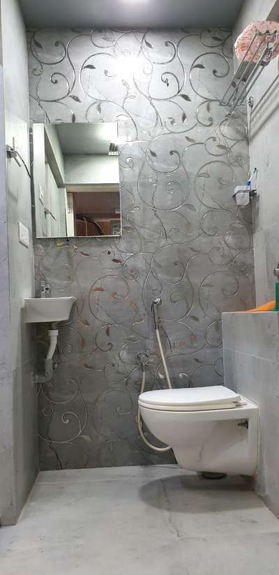 very minimal design of grey and silver floral pattern in bathroom #BathroomDesigns  #BathroomTIles  #BathroomTIlesdesign  #floraldesign  #minimalinteriors  #madeinindia