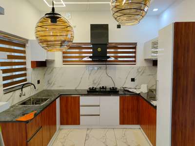 wood and white kitchen cupboard.9947989563 #KitchenIdeas  #ModularKitchen  #modular  #KitchenCabinet  #InteriorDesigner