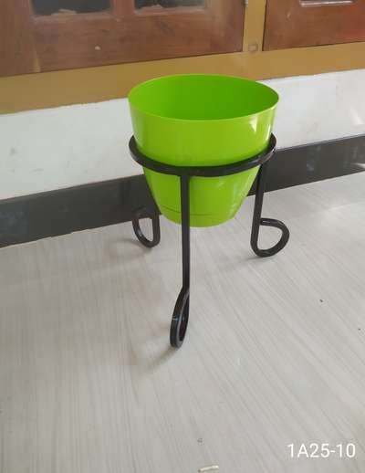 METAL STAND FOR INDOOR PLANTS.
 
Durable, Eco friendly. Rest free, Not harmful for any floor, Adjustable legs for leveling.