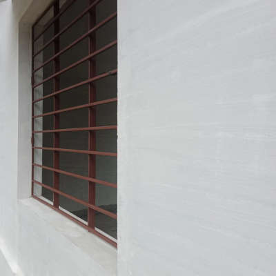 Simple steel grill work for sliding upvc window. Residential project @ Padinjarathara, Wayanad