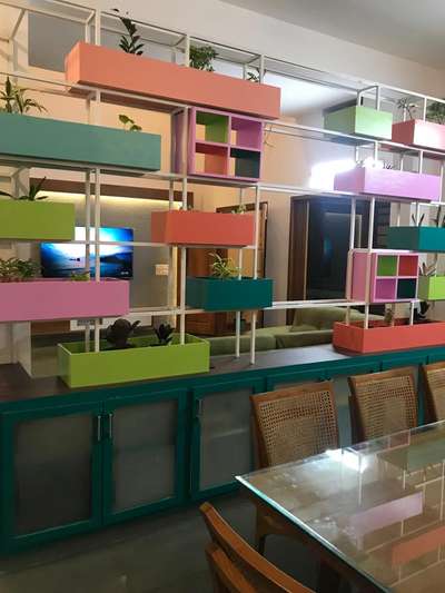 colour full partition between living and dining dpace