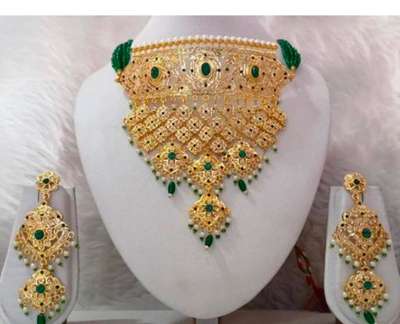 Jewellery Set
Name: Jewellery Set

Plating: Gold Plated
Stone Type: Pearls
Type: Necklace and Earrings
Rajputi jewellery , Rajputi aad with earrings
Country of Origin: India6350495949