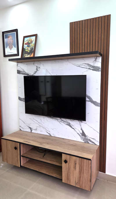 TV unit done in a recently renovated flat near Lourde hosoital, Kochi

 #tvunits 
#tvconsole 
#TVunit
#InteriorDesigner 
#interior
#Interiordesign
#LivingroomDesigns 
#Livingroom