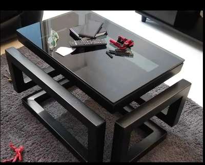 Coffee Table. The frame of the table is made out of 2 inch steel with poweder coat finish and the frame size is 30 x 20 inch.