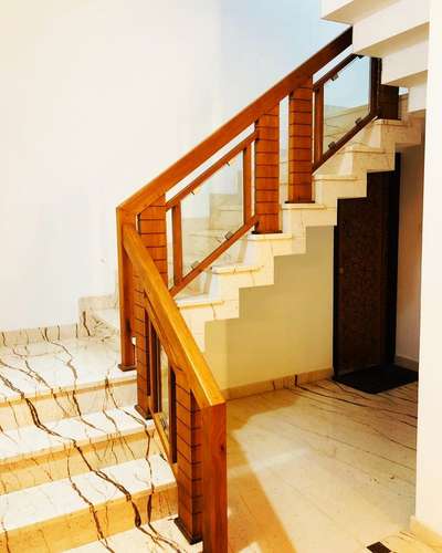 stair
client: SAJID PR
#italianmarble #Woodenhandrail 

#interior #interiordesign #kolo #vastuexpert #Vastuconsultant #brick #lateritestone #cladding #NorthFacingPlan #smallplan #SmallHouse #lowcosthouse #homeinterior #beautifulhouse #KitchenInterior #MasterBedroom #GlassHandRailStaircase #KeralaStyleHouse #architecturedesigns #keralahomeplans #keralatraditional #modernhome