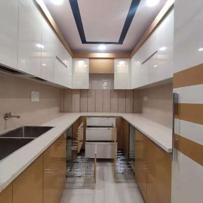 kitchen wark complete by our team u shaped kitchen  #KitchenIdeas  #LargeKitchen  #ClosedKitchen  #LShapeKitchen  #KitchenCabinet  #WoodenKitchen  #KitchenRenovation  #ModularKitchen  #KitchenInterior  #OpenKitchnen