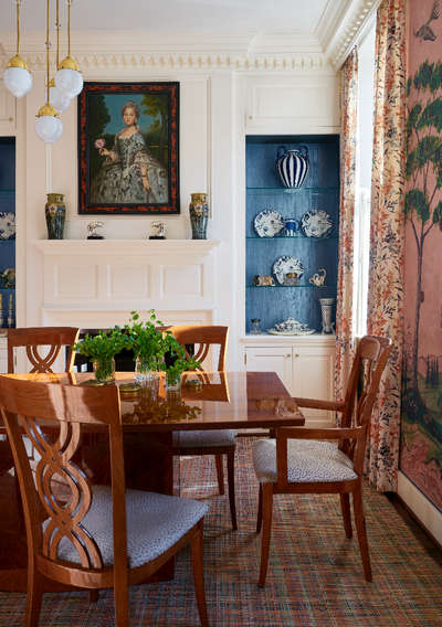 Decorate your dining room with botanical theme wall paper, floral print curtains and small potted plants. Go for an open shelf in any corner for displaying your favorite dinnerware in an orderly fashion. Add pendant lights, frames and pottery to decorate your space. #interior #decor #ideas #home #interiordesign #indian #colourful #decorshopping