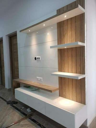 wooden veneer & acrylic combo finished tv shelfs  #LivingRoomTVCabinet  #InteriorDesigner  #BedroomDecor  #KitchenIdeas  #TexturePainting  #FlooringSolutions  #WallPainting  #ModularKitchen  #WardrobeIdeas