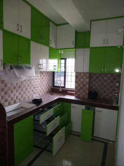 Modular kitchen work by Shakuntalm Interior designers