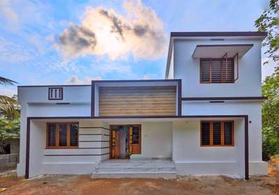 🏡🏡 Finished Home 

Location : Vadavannur , Palakkad
Built-up area: 1250sqft 2bhk
completed year : 2020 
Time period: 8 month 
Engineer: Manu  r 
 #CivilEngineer #civilconstruction #HouseConstruction #newideas #innovativedesigns #ContemporaryHouse #ContemporaryDesigns #contemporary