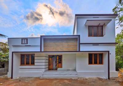 🏡🏡 Finished Home 

Location : Vadavannur , Palakkad
Built-up area: 1250sqft 2bhk
completed year : 2020 
Time period: 8 month 
Engineer: Manu  r 
 #CivilEngineer #civilconstruction #HouseConstruction #newideas #innovativedesigns #ContemporaryHouse #ContemporaryDesigns #contemporary