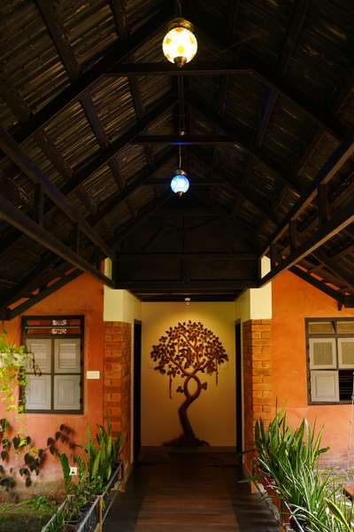 Verandah, which connects the private and semi public area, The courtyard and pond also separates the living space into private and public areas,
with the living, dining and kitchen.
The movement of the visitor from the busy areas cuts across the various buffer zones.

#entenilambur #nilambur #kolo #designkerala #vanithaveedu #keralahouse #keralahomes #designindia.
.#veedu #residence #tropical #tropicalarchitecture #keralahomes #keralahomedesign #traditionalhome #traditionalhouse #keralahomeplanners #keralahomes  #designkerala #vanithaveeduofficial 
 #kolo #vanithaveedu #naatiloruveedu #entenilambur #koloapp
#veedumplanum #archdaily