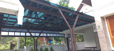 #black tinted toughened glass pergola work