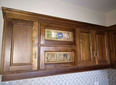 teak wood kitchen cabinet 
 #InteriorDesigner #KitchenIdeas #LargeKitchen #ModularKitchen #modernhome #koloapp #trivandrumhomes