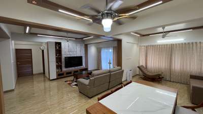 Living room and dining room  #livi #dinningtabledesign  #LivingRoomCeilingDesign  #modularTvunits  #pillar_paneling  #wall_paneling