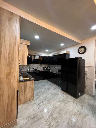 kitchen starts ₹1500/- per sqft 
BLACKCAD INTERIOR 

 #KitchenIdeas  #WoodenKitchen  #KitchenRenovation  #LargeKitchen  #blackkitchen  #darkwoodinterio  #InteriorDesigner  #Architectural&Interior  #LUXURY_INTERIOR  #KitchenInterior