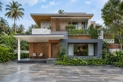 #tamilnadu #Coimbatore  #kochi #ernakulam #4bhk  #4500sqftHouse  #conceptualdesign #architecturedesigns  #ContemporaryDesigns  #moderndesign  #doublestorey #hometheaterdesign   #LandscapeIdeas  #BalconyIdeas  #InteriorDesigner  #Architectural&Interior  #LandscapeDesign  #facadedesign