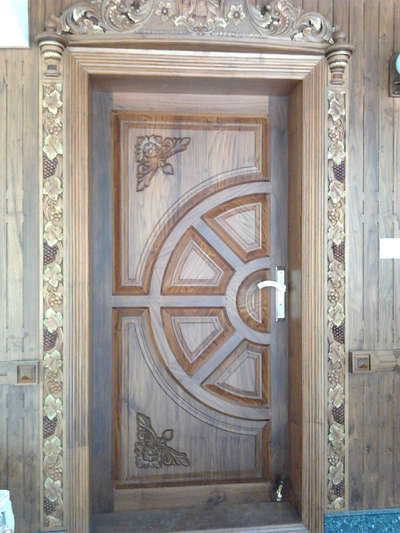 #divinecarpentry 
teak wood front door