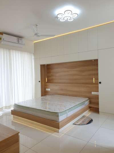 #masterbedroom #bed #storage #wardrobe #lighting #wallpainting #curtain #decor #interior #bengaluru #bangalore #design #interiordesigner