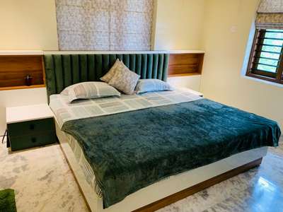 Modern Bedroom Design by SAK DESIGNS!!! Completed Project @Anakkayam.

#headboarddesign #cotheadwalldesign #sidetable 
#4DoorWardrobe #WardrobeIdeas #WardrobeDesigns #wardrobemanufacturer 
#BedroomDecor #modernbedroom #modernbedroomideas #BedroomDesigns #bedroominteriors #bedroomset #MasterBedroom   #LivingRoomPainting #LivingroomTexturePainting #LivingRoomDecoration #LivingRoomCeilingDesign #livingroomdesign  #LivingRoomIdeas #CoffeeTable #curtainsdesign 
#BedroomDecor #KingsizeBedroom #InteriorDesigner #TexturePainting #LivingroomTexturePainting  #Architectural&Interior #MasterBedroom #BedroomDesigns #beatuifuldesign #beautifulhomedesigns #beautifullight #profilelights #Toughened_Glass #glasswardrobe #corian #coriancountertop #romanblinds #dressinginterior #dressingunit #interiordesign #interiordesignkerala #girlsroom #TexturePainting #bigrooms #BedroomIdeas #BedroomCeilingDesign #LUXURY_BED #bedsidetable #sidetable #bedroomdeai
