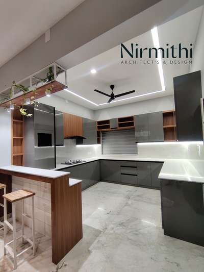 Modern kitchen - Recently finished in Kannur.
Material used - Marine plywood with Laminated sheet. Nano white counter top.

#InteriorDesigner #KitchenIdeas #OpenKitchnen #homeinterior #HomeDecor