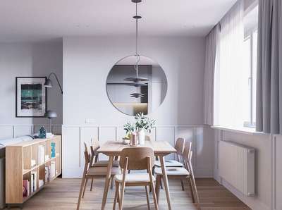 grey theme with wooden flooring, circular mirror on the centre wall luxury wooden dinning table , hanging lights and drawer unit for storage
it is a perfect combination of colour and texture
 #colordeccor  #wooden
 #DiningChairs  #GlassMirror  #WoodenFlooring
